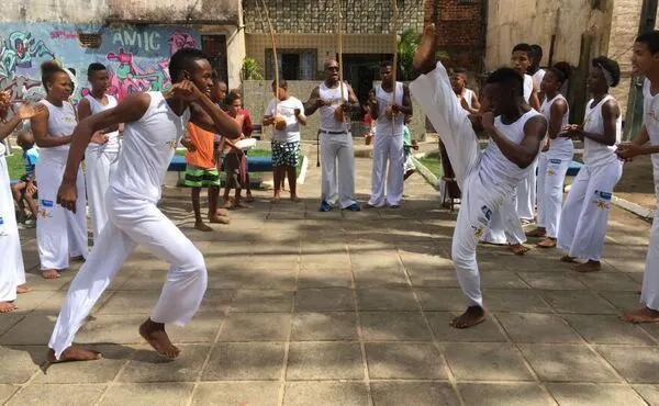 men performing capoeira martial arts