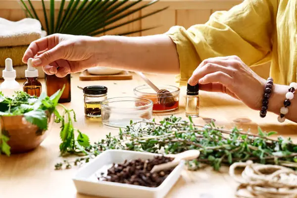woman preparing for naturopathy therapy with different medicines